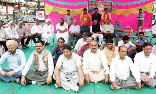 Excelsior Rakesh Activists of Hindu organizations staging a demonstration in front of Press Club Jammu on Monday.