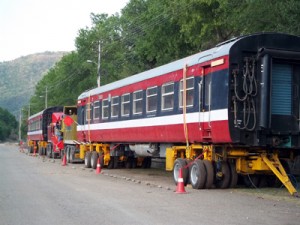 Coaches loaded on specially designed auto trailer awaiting green signal for transportation to Kashmir valley from Udhampur Railway Station. Coaches loaded on specially designed auto trailer awaiting green signal for transportation to Kashmir valley from Udhampur Railway Station.