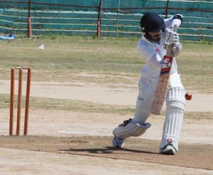 Batsman driving through covers during a semifinal match between Kashmir Cricket Club and KCCC at MA Stadium on Wednesday. 