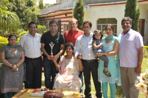 Founder of Happy Model School Udhampur, Kamal Gulati felicitating IAS qualifiers Rakesh and Nitish in school premises on Sunday. Founder of Happy Model School Udhampur, Kamal Gulati felicitating IAS qualifiers Rakesh and Nitish in school premises on Sunday.