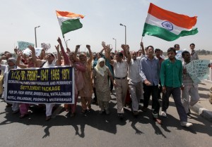 PoK refugees taking out protest rally from Bikram Chowk in Jammu on Thursday. 