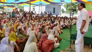 Minister for Industries S S Slathia addressing a public meeting on Thursday. Minister for Industries S S Slathia addressing a public meeting on Thursday.