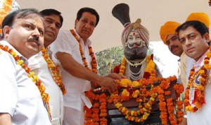 Minister for Medical Education R.S Chib garlanding bust of Maharaja Gulab Singh on 72nd Foundation Day of SMGS Hospital on Sunday.