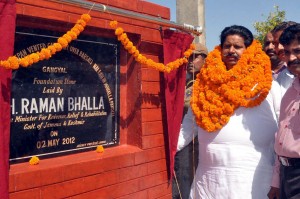 Minister for Revenue, Relief and Rehabilitation Raman Bhalla laying foundation stone at Gangyal on Wednesday.