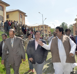 Minister for Revenue, Raman Bhalla and other dignitaries inspecting the flats for Kashmiri Pandits at Budgam on Tuesday. Minister for Revenue, Raman Bhalla and other dignitaries inspecting the flats for Kashmiri Pandits at Budgam on Tuesday.