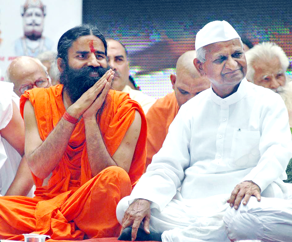 Yoga Guru Swami Ramdev and Civil Society leader Anna Hazare with others at one day fast on Black money issue near Parliament House in New Delhi on Sunday. (UNI) Yoga Guru Swami Ramdev and Civil Society leader Anna Hazare with others at one day fast on Black money issue near Parliament House in New Delhi on Sunday. (UNI)