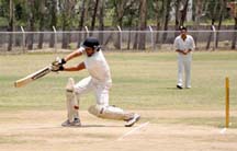 Left-handed batsman executing a front-foot drive during a match between Reasi XI and Udhampur XI at GGM Science College ground on Tuesday. Left-handed batsman executing a front-foot drive during a match between Reasi XI and Udhampur XI at GGM Science College ground on Tuesday.