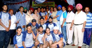 Winners of Kabaddi titles posing for a group photograph along with dignitaries on Tuesday.