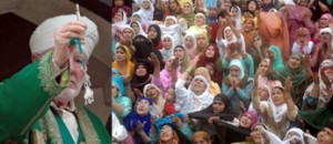 A cleric displaying the holy relic of Prophet Muhammad (SAW), at Hazratbal Shrine in Srinagar on Shab-e-Meraj on Monday. A cleric displaying the holy relic of Prophet Muhammad (SAW), at Hazratbal Shrine in Srinagar on Shab-e-Meraj on Monday.