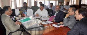 Chief Secretary, Madhav Lal chairing meeting with officers at Srinagar on Monday.