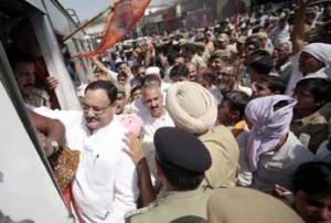 BJP national general secretary JP Nadda boarding a bus after being arrested by police at Parade on Monday. -Excelsior/Rakesh BJP national general secretary JP Nadda boarding a bus after being arrested by police at Parade on Monday. -Excelsior/Rakesh