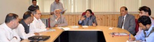 Chairman, Legislative Council, Amrit Malhotra chairing a meeting at Srinagar on Thursday.