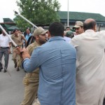 Cops preventing MLA Engineer Sheikh Rashid from taking dogs to Secretariat on Wednesday.	-Excelsior/Amin War