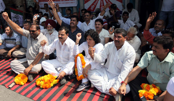 NPP leaders and activists staging protest dharna against State Government in Jammu on Monday.