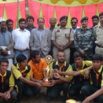 Winning team of Open Volleyball Tournament posing for photograph with Police Officers and other dignitaries at Gool, Ramban on Sunday.
