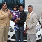 ADGP Headquarters, SP Vaid presenting key to the Ist prize winner of the Raffle Draw Prizes at Srinagar on Monday.