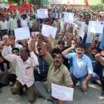 Northern Railway employees protesting against FDI in pension at Jammu on Monday.