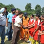 Prof Naresh Padha, Registrar University of Jammu interacting with players, while inaugurating Inter-Collegiate Hockey Tournament.