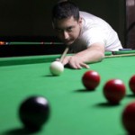 Eyeing target Sohail Khalid executing a shot in Pre-quarters match at Billiards Hall, MA Stadium on Monday. -Excelsior/Rakesh