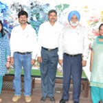 Prof. Mohan Paul Singh Ishar, Vice Chancellor, posing for a photograph alongwith the young scientists, who brought laurels to University.