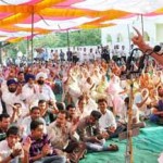 Minister for Industries and Commerce, Surjit Singh Slathia addressing a public gathering at Vijay constituency on Tuesday.