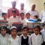 Deputy General Manager of PNB with students of Bal Niketan posing for a photograph at Jammu on Tuesday.