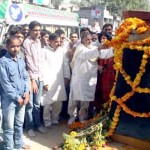 Prof Bhim Singh, Harshdev Singh and others paying tributes to student leaders at Shaheedi Sathal, GGM Science College main gate on Wednesday. Excelsior/Rakesh