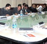 Minister for Higher Education, Abdul Gani Malik chairing J&K Building and Other Construction Workers Welfare Board meeting on Friday.