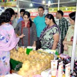 Customer having a look at stall at Kala Kendra on Sunday.