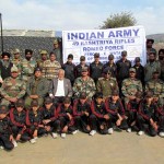 Students alongwith Army officials posing for a group photograph offer completion of tour at Mendhar. -Excelsior /Nazki