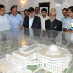 Speaker Legislative Assembly, Mohammad Akbar Lone and Minister for Law, Ali Mohammad Sagar having a look at model of new Legislative Complex on Wednesday.