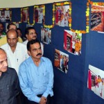 Deputy Chief Minister Tara Chand during photo exhibition at Kala Kendra on Thursday.