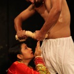 A scene from Balwant Thakur's Dogri play 'Ghumayee' being performed at Sports Stadium, Kathua on Sunday.