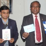 Chief Postmaster General John Samuel showing Greeting Cards at a press conference at Jammu on Tuesday.