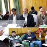 Minister for Law, Ali Mohammad Sagar chairing a meeting at Jammu on Wednesday.
