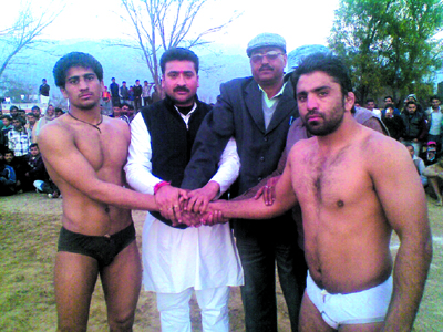 Wrestlers being felicitated during 4th Akhli-Buttan Kesari dangal at Dansal in Jammu on Monday.