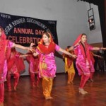 Students presenting cultural item during Annual Day celebration at Dogra HSS Shastri Nagar in Jammu on Sunday.