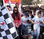 Minister for Sports Taj Mohi-ud-Din and Minister for Horticulture Raman Bhalla flagging off 4th Jammu Marathon at MA Stadium on Sunday.