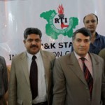 CIC GR Sofi alongwith others posing in front of the logo, which was adopted by State Information Commission on Friday. -Excelsior/Rakesh