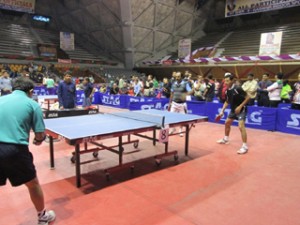Players in action during Table Tennis match at Sher-e-Kashmir Indoor Complex, Srinagar.