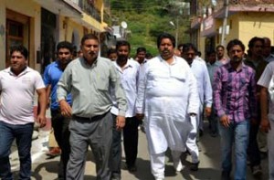 Minister for Housing Raman Bhalla during his visit to constituency on Monday.