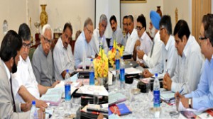 Governor, N N Vohra chairing University Council meeting at Raj Bhavan on Friday.