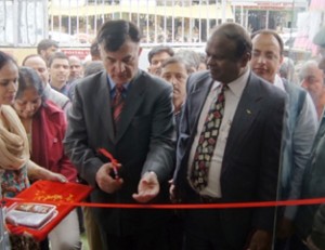 Member Parliament Mehboob Beg and Chief Postmaster General John Samuel inaugurating Post Office at Qazigund on Friday.