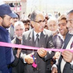 Minister for Agriculture Ghulam Hassan Mir inaugurating ATM at Chandilora on Sunday.