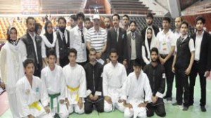Participants of State Takewon-Do Championship posing alongwith MLA Mustafa Kamal in Srinagar on Friday.