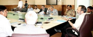 Chief Secretary Mohammad Iqbal Khanday chairing a meeting at Srinagar on Monday.