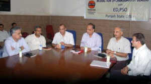Indian Oil top executives interacting with retail outlet dealers at Chandigarh on Wednesday.