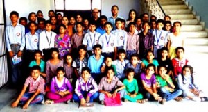 Students posing for a group photograph during concluding function of Summer Camp at Adarsh College of Education.