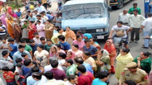 Irate residents protesting at Tali Morh against power failure on Thursday.