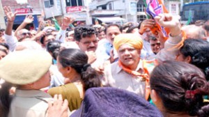 BJP leader Ashok Khajuria leading court arrest at Kathua on Thursday. -Excelsior/Madan